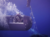 A Seal Delivery Vehicle on Tether with a Buoy Recovery Line
