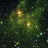 Two Extremely Bright Stars Illuminate a Greenish Mist in Deep Space