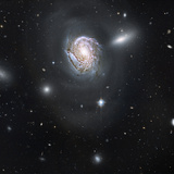 Spiral Galaxy NGC 4911 Located Deep Within the Coma Cluster of Galaxies