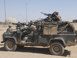 British Paratroopers on Patrol in their Land Rover