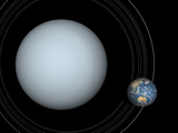 Artist's Concept of Uranus and Earth to Scale