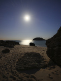 A Full Moon Skyscape over a Small Beach Called Portinho Da Arrabida  Portugal