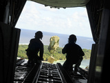 A Box of Humanitarian Goods Travels to the Yap Islands During Operation Christmas Drop