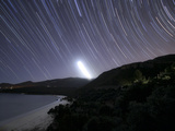 Moonset and Star Trails Behind the Arrábida Mountain Range in Portugal
