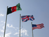 The Union Flag of the United Kingdom Between the Afghanistan and United States Flags