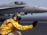 A Shooter Launches an F/A-18E Super Hornet from USS Ronald Reagan