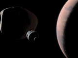 A Command Module Begins a Close Approach to Phobos