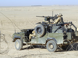 Gurkhas Patrol Afghanistan in a Land Rover
