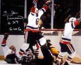 John Tonelli Autographed Game Winning Goal Photograph