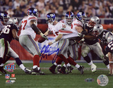 Eli Manning Autographed Super Bowl XLII Escaping Tackle Photo
