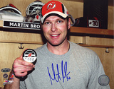 Martin Brodeur Autographed Pose With 552nd Puck Photograph