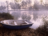 A Boat on the Shore of Misty Lake Banyoles