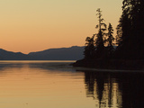 Calm Bay at Sunset Surrounded by Boreal Forest  Southeast Alaska