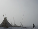 A Komi Reindeer Herder Carries Snow to Her Chum to Melt for Water