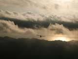An Ultralight Flies over the Nicoya Peninsula at Sunset