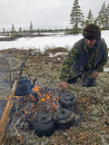 A Komi Reindeer Herder Makes Tea During Reindeer Calving Season