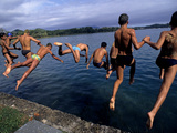 Men Jumping into Lake Banyoles