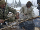 Komi Reindeer Herders Grill Reindeer Meat on a Stick over Coals