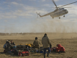 A Helicopter Lands to Ferry Passengers Back to Arkhangel'sk