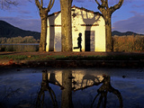 A Jogger on the Shore of Misty Lake Banyoles