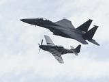 An F-15 Eagle and the P-51 Mustang Fly in Formation