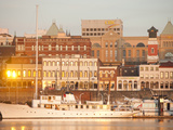 A Boat Sits at Anchor in Front of Old Town Victoria