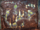 Detail of Company Info on Old  Abandoned Truck Door