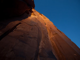 A Man Climbing on the Cat Wall in the Final Minutes of Daylight