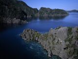 Shoreline with Limestone Karst Formations and Coral Reefs