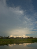 Thunderheads Billow over the Amazon Jungle and Yanayacu River in Peru