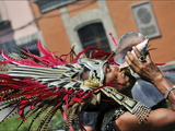 A Conchero Aztec Dancer Elebrates Toxcatl  Dedicated to the Sun