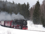 Meter-Gauge 2-10-2T Steam Locomotive 99 7241-5 in a Snowy Landscape