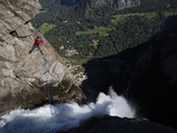 A Climber  Attached by a Tether  Crosses an Inch-Thick Highline Above Yosemite Falls