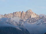 Mount Whitney Covered in Snow and Low Clouds