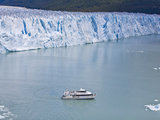 Tourist in a Boat Close to Perito Moreno Glacier Hope to Witness Calving