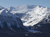 The Snow-Dusted Canadian Rocky Mountains and Lake Louise Below