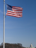 United States Flag Flying at the Washington Monument Capitol Beyond