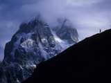 A Hiker on a Ridge Near Mount Ushba on the Georgian-Russian Border