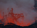 Gas Bubbles Explode over a Fiery Lava Lake in Nyiragongo's Crater