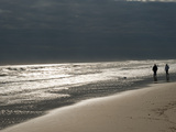 A Couple on the Atlantic Shoreline and Sunlight Reflections