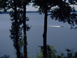 Boat Zipping Through the Calm Waters of Kentucky Lake