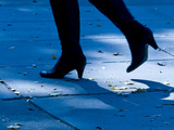 Detail of a Woman in Boots  Walking