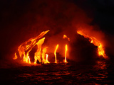 Glowing Hot Lava Flowing into the Sea at Night