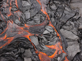 Orange Lava Glowing under Black Hardened Lava