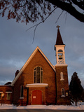Sunrise Lights Up an Old Church and Bell Tower