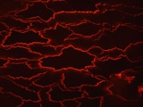 Molten Rock Cools and Forms Plates on the Surface of a Lava Lake