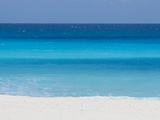 Shades of Blue Color the Beachfront Waters in Cancun  Mexico