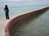 A Girl on a Walkway around Fort Jefferson