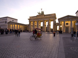 Tourists at the Brandenburg Gate at Twilight