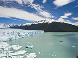 Tourist in a Boat Close to Perito Moreno Glacier Hope to Witness Calving